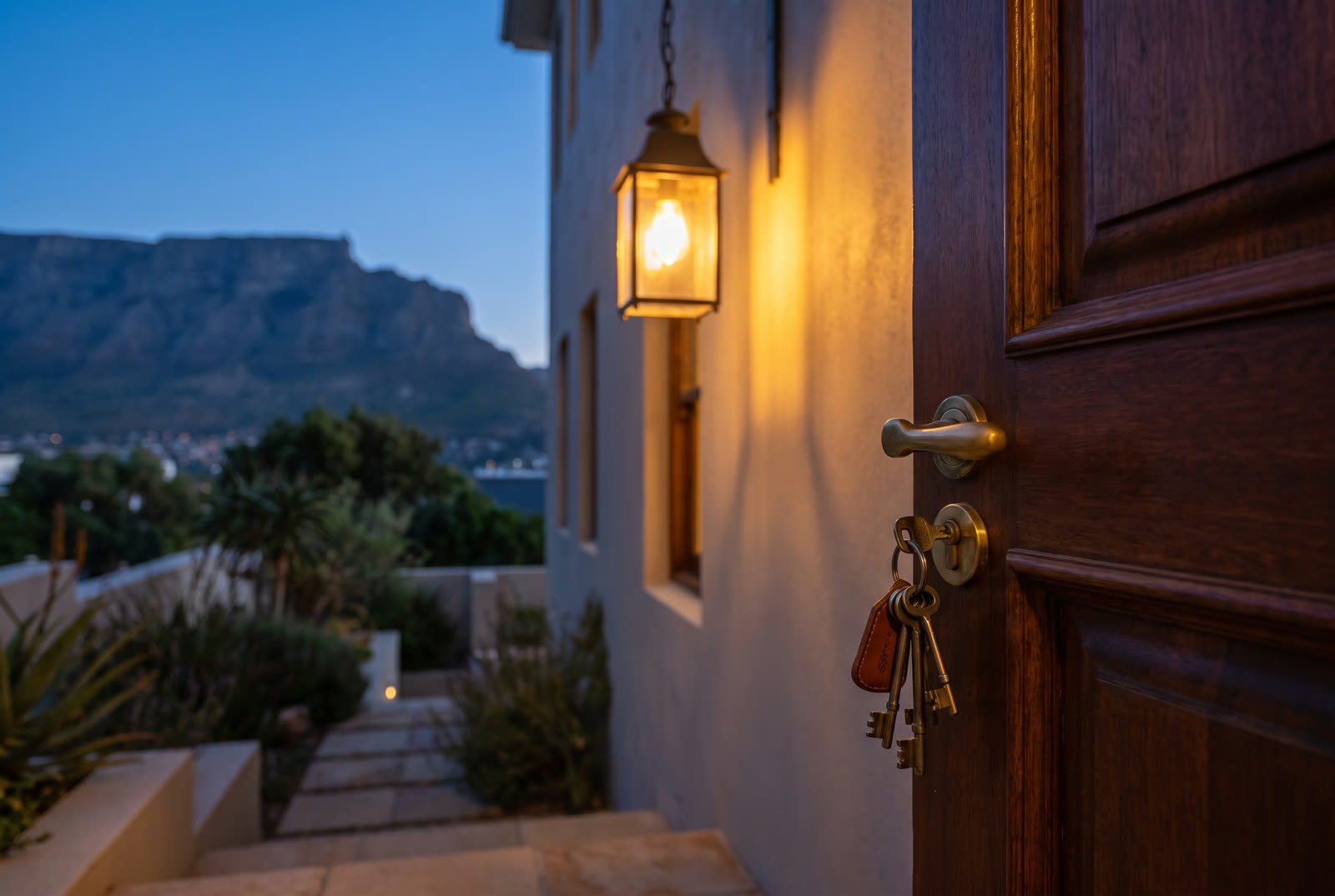 A locksmith vehicle working a Cape Town street after dark