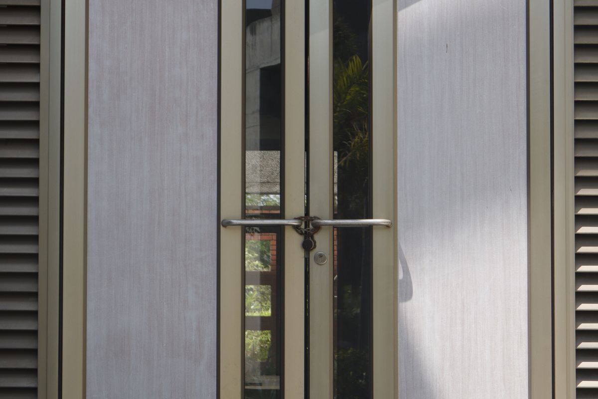 Contemporary glass and metal double doors